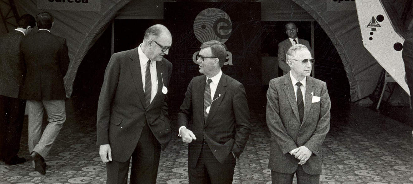 L-R: George Van Reeth, ESA Director of Administration, Reimar Lüst and Wilhelm Brado, ESA Head of Cabinet, waiting President Mitterrand at Le Bourget, 1985.  © ESA